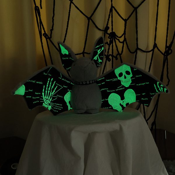 Luminous Bat Plushie - Glow in the dark: The plushie is shown glowing in the dark from a front view